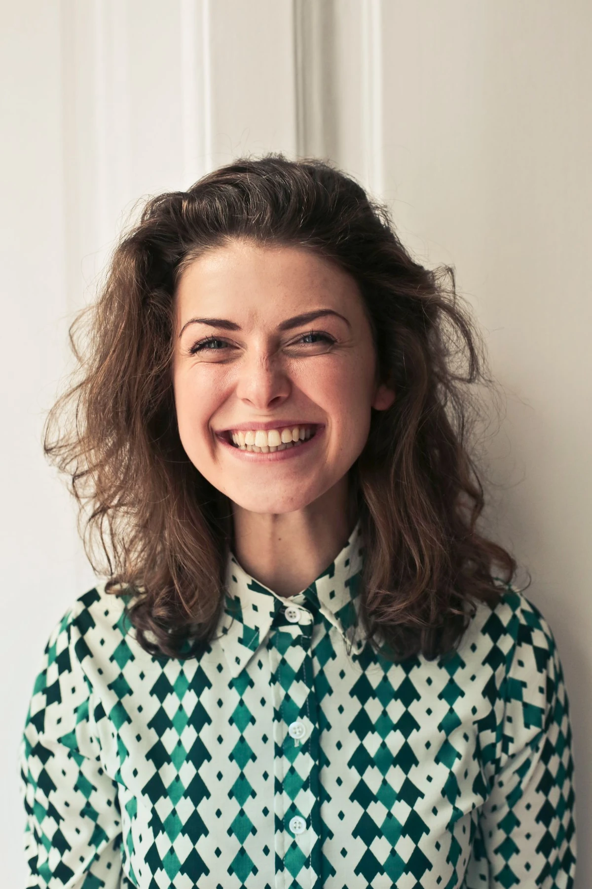 A woman sharing a natural smile.